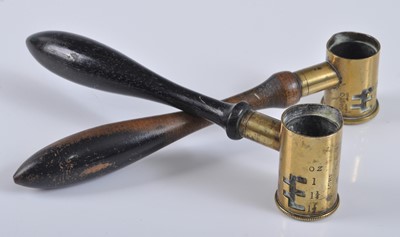 Lot 326 - A 19th century shot measure, the brass bowl...