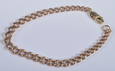 Lot 2636 - A yellow metal curblink bracelet, stamped 375...