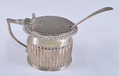 Lot 1074 - A George IV silver mustard pot, of half reeded...