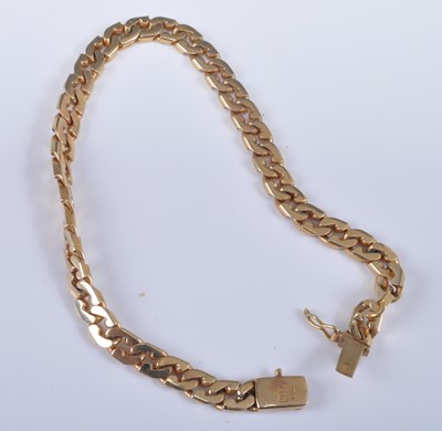 Lot 2649 - A 14ct yellow gold metric curblink bracelet,...