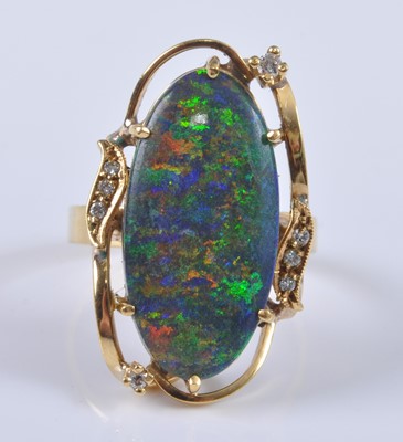 Lot 2653 - A yellow metal treated opal and diamond dress...