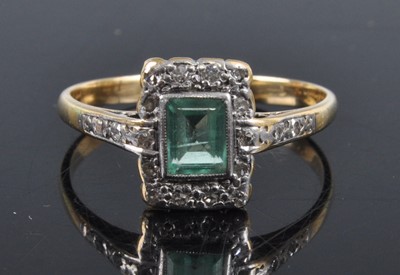 Lot 2682 - A yellow metal, emerald and diamond ring, the...