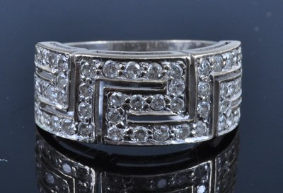 Lot 2695 - An 18ct white gold diamond set half eternity...