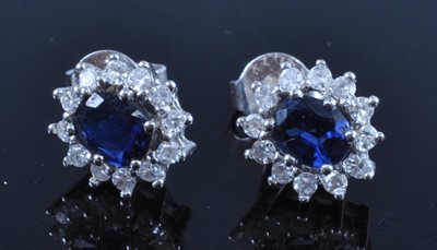 Lot 2698 - A pair of 18ct white gold, sapphire and...