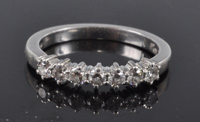 Lot 2671 - A contemporary platinum and diamond half...