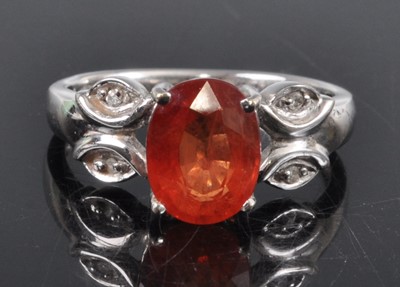 Lot 2705 - A contemporary 18ct white gold, padparadscha...
