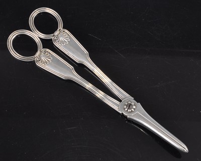 Lot 1089 - A pair of Victorian silver grape scissors, in...