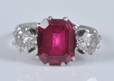 Lot 1125 - A white metal, synthetic ruby and diamond...