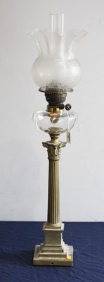 Lot 122 - A Victorian pedestal oil lamp, having an...