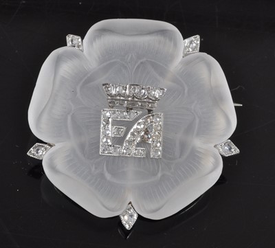 Lot 1195 - A white metal carved rock crystal Tudor Rose...