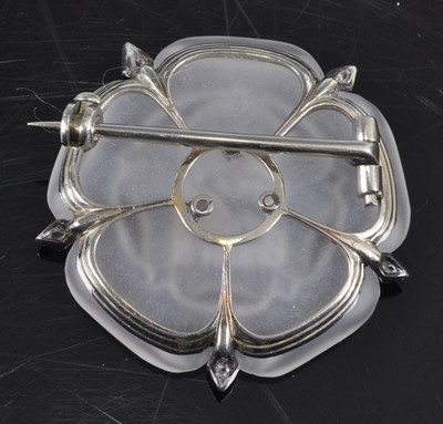 Lot 1195 - A white metal carved rock crystal Tudor Rose...