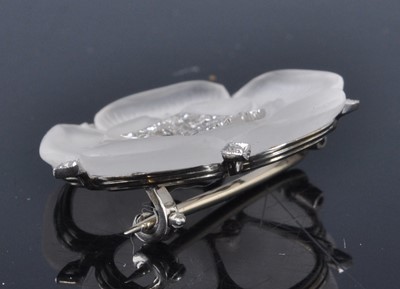 Lot 1195 - A white metal carved rock crystal Tudor Rose...