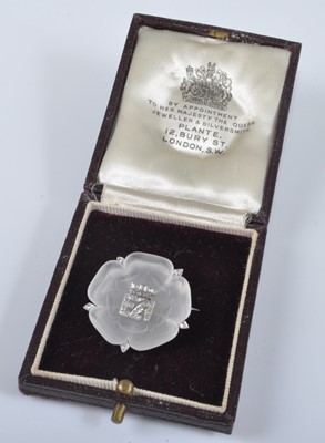 Lot 1195 - A white metal carved rock crystal Tudor Rose...