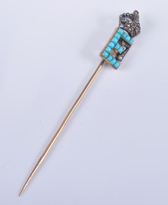 Lot 1199 - A yellow metal royal monogram stick...