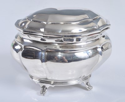 Lot 1105 - A George V silver sugar box, of lidded oval...