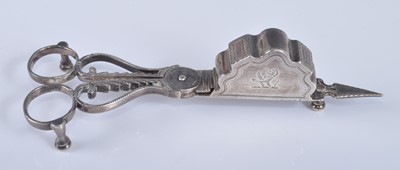 Lot 1064 - A pair of George III silver wick scissors,...