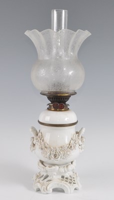 Lot 1261 - A 19th century blanc de chine porcelain oil...