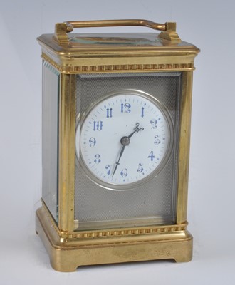Lot 1372 - A late 19th century French lacquered brass...