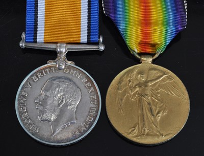 Lot 58 - A WW I British War and Victory pair, naming...