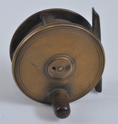 Lot 372 - An unmarked 2 1/2" brass centre pin reel.