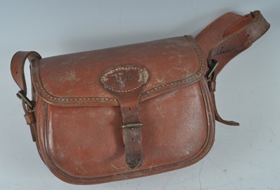 Lot 336 - A brown stitched leather cartridge bag, with...