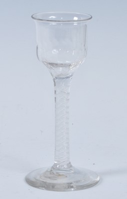 Lot 1039 - A circa 1765 wine glass, the lipped and basal...