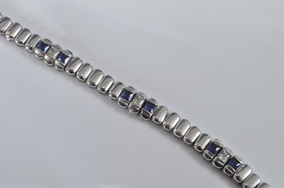 Lot 1160 - A white metal sapphire line...