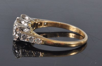 Lot 1162 - A yellow and white metal diamond three stone...
