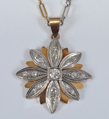 Lot 1163 - A yellow and white metal diamond flower...