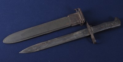 Lot 137 - A U.S. Garand M1 rifle bayonet, the 25cm blade...