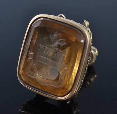 Lot 1136 - A late Georgian yellow metal fob seal, the...