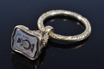 Lot 1139 - An early Victorian yellow metal fob seal, the...
