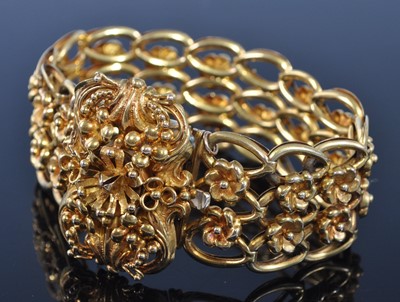 Lot 1141 - An early 20th century hollow yellow metal...