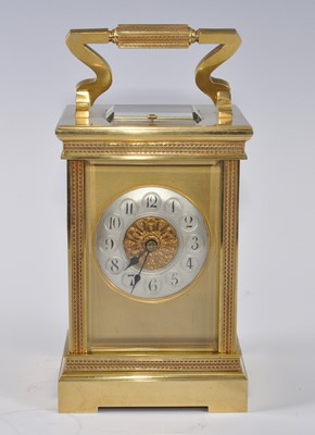 Lot 1371 - A circa 1900 lacquered brass carriage...