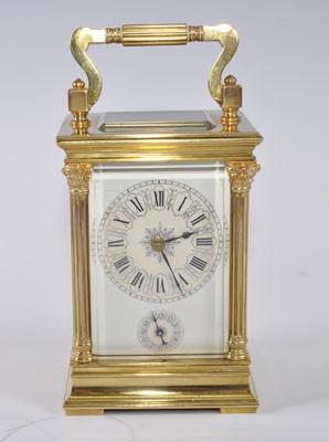 Lot 1373 - A circa 1900 lacquered brass carriage...