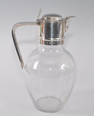 Lot 1088 - A Victorian silver topped and glass claret jug,...