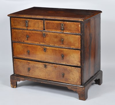 Lot 1410 - An early 18th century walnut and inlaid chest,...