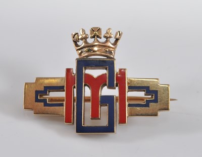 Lot 1206 - A Cartier yellow metal Royal monogram bar...