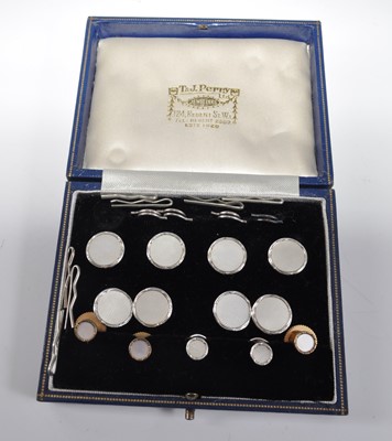 Lot 1208 - A 9ct white gold button, cufflink and dress...
