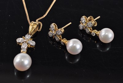 Lot 1178 - An 18ct yellow gold, pearl and diamond pendant...