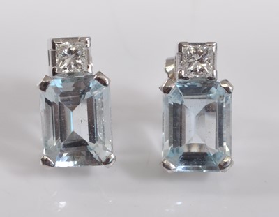 Lot 1181 - A pair of 18ct white gold, aquamarine and...
