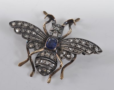 Lot 1183 - A yellow and white metal, sapphire and diamond...