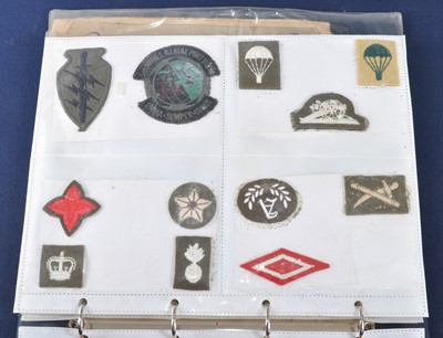 Lot 295 - A collection of cloth insignia to include...
