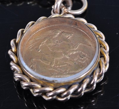 Lot 1224 - An 18ct gold curblink watch chain with Albert...