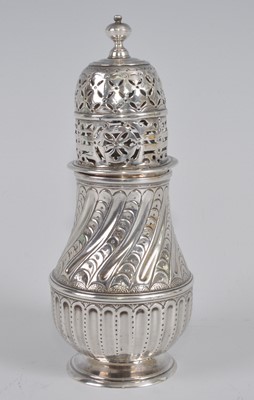 Lot 1058 - A Queen Anne Britannia standard silver sugar...