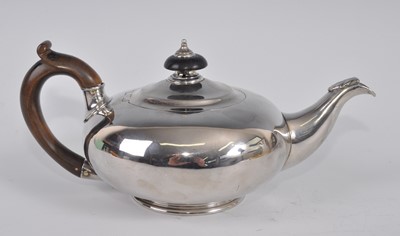 Lot 1077 - A William IV silver bachelors teapot, of plain...