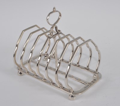 Lot 1100 - An Edwardian Scottish silver six-division...