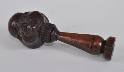 Lot 1244 - A 19th century treen figurative...
