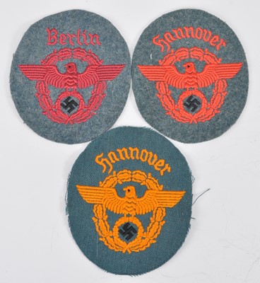 Lot 127 - A German Third Reich Police cloth arm badge,...