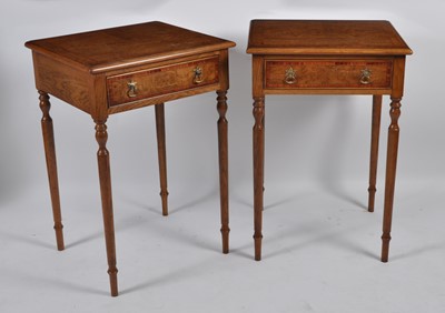 Lot 1438 - A pair of contemporary oak lamp tables, each...